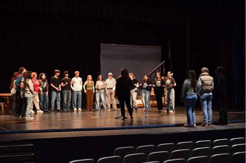 Onstage with student leaders and the choral students of Smoky Mountain High School in Sylva. Courtesy of Shaneka Allen, Jackson County Public Schools